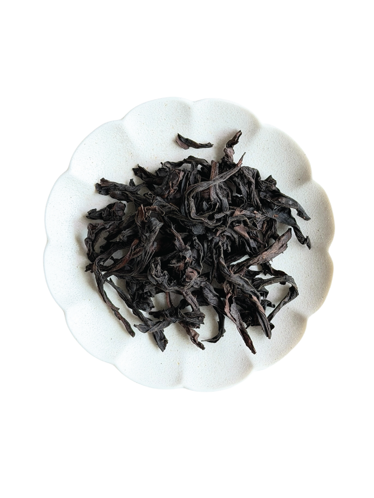 Roasted dried loose leaf stripped tea leaves. 