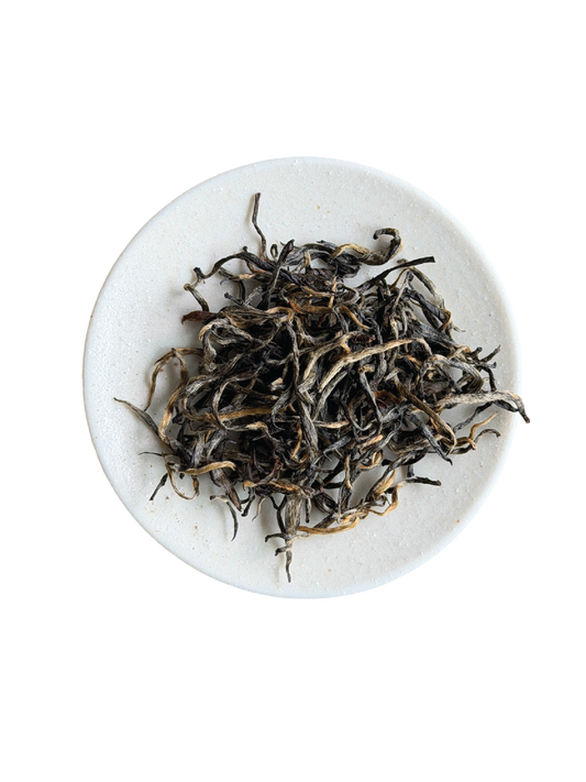 A 70% black, 30% golden tips in the dry leaves suggest an authentic Jin Jun Mei Black Tea. 