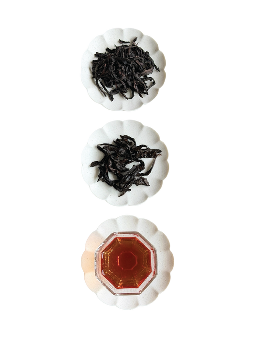 Shui Xian - Wuyi Rock Oolong, showing the dry leaf, wet leaf and the tea liquor. Tea liquor is a nice reddish amber and absolutely fragrant. 
